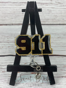 Topper Only 911 Dispatch Glitter Badge Reel