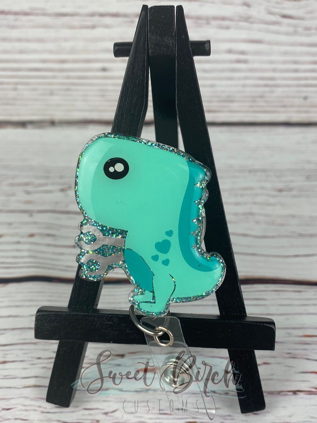 Dino with Arm Extenders Glitter Badge Reel